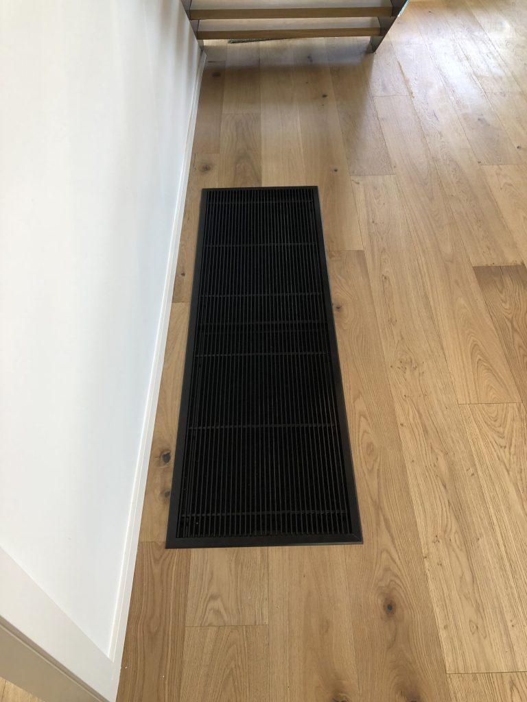 Daikin Ducted unit with Black floor return air grille floor -
